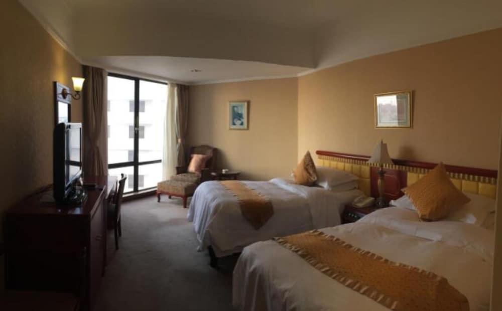 Huiquan Dynasty Hotel Qingdao Exterior foto