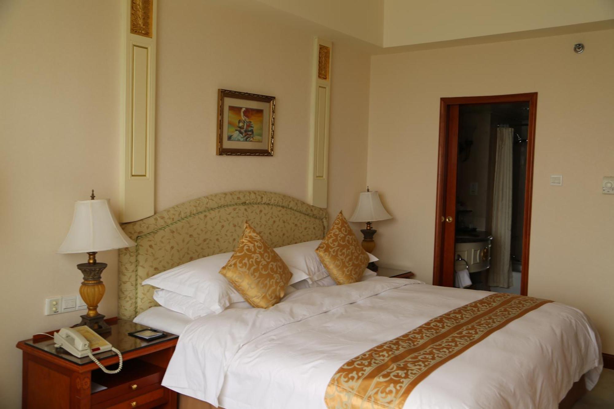 Huiquan Dynasty Hotel Qingdao Quarto foto
