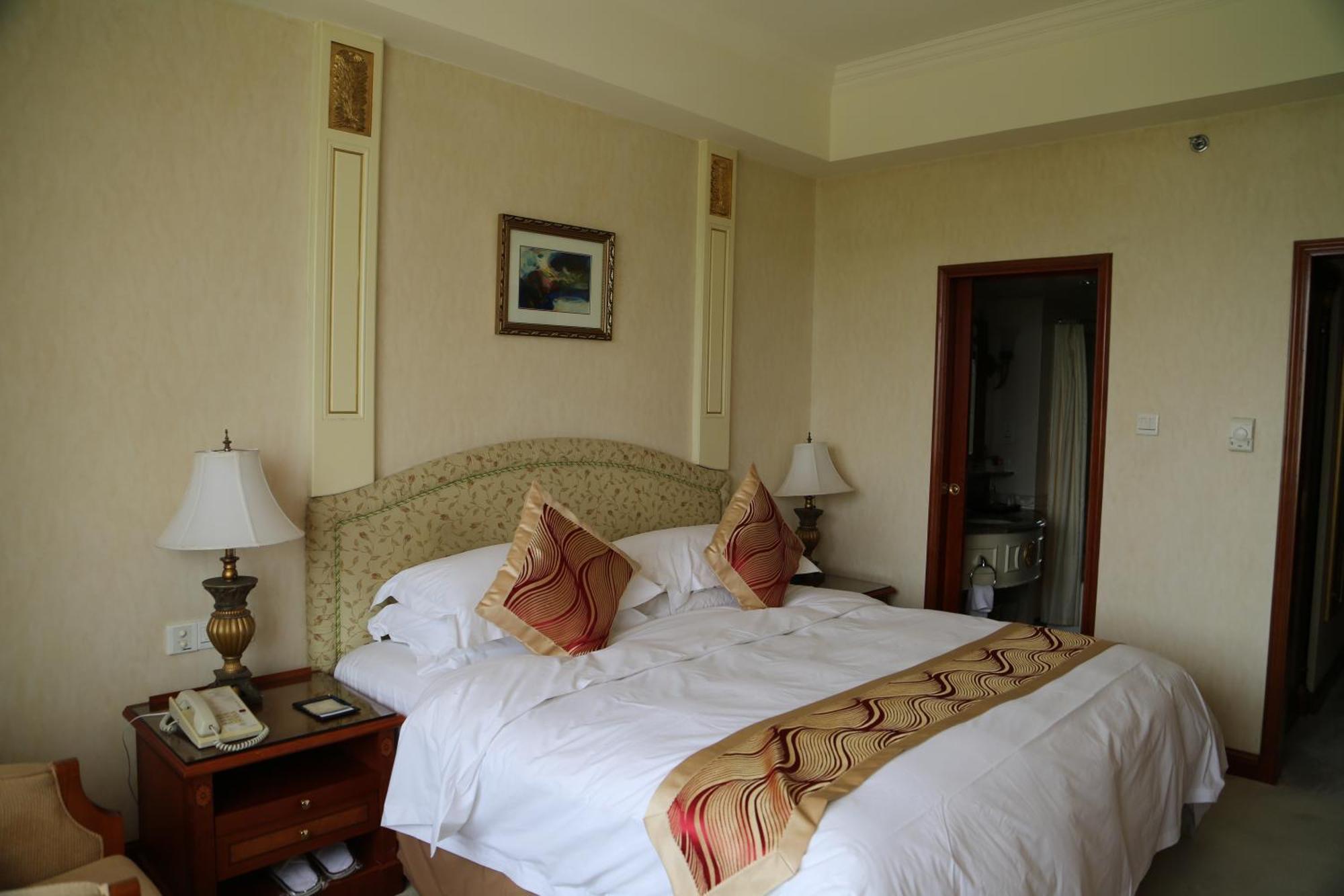 Huiquan Dynasty Hotel Qingdao Quarto foto