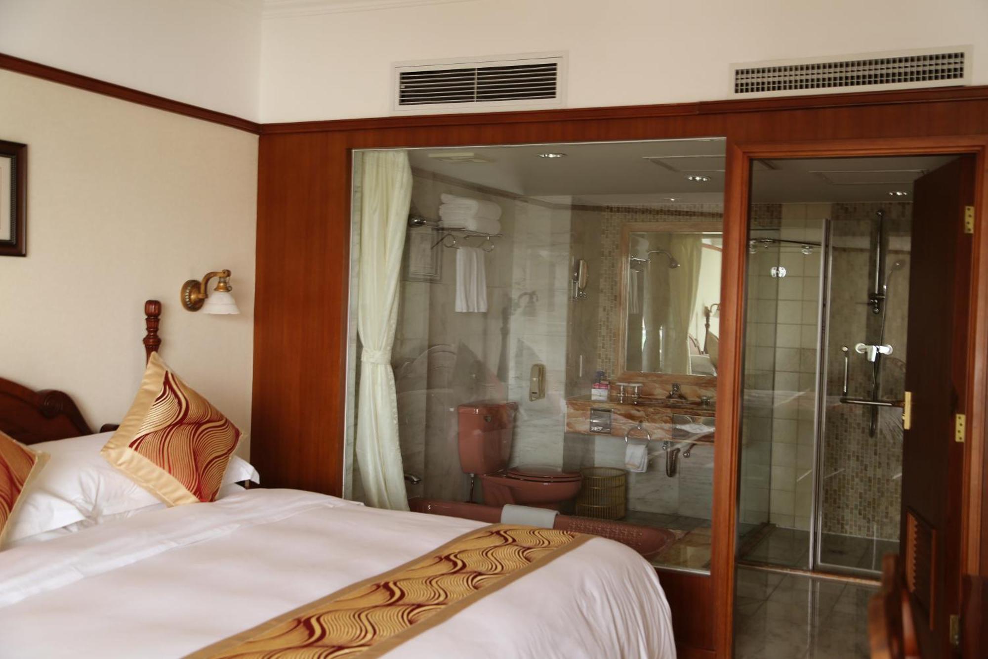 Huiquan Dynasty Hotel Qingdao Quarto foto